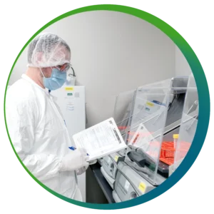 Puresyn employee in clean lab performing a quality check